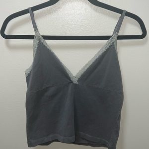 Brandy Melville. Dusty green tank top with lace lining on the top. Size: XS/S